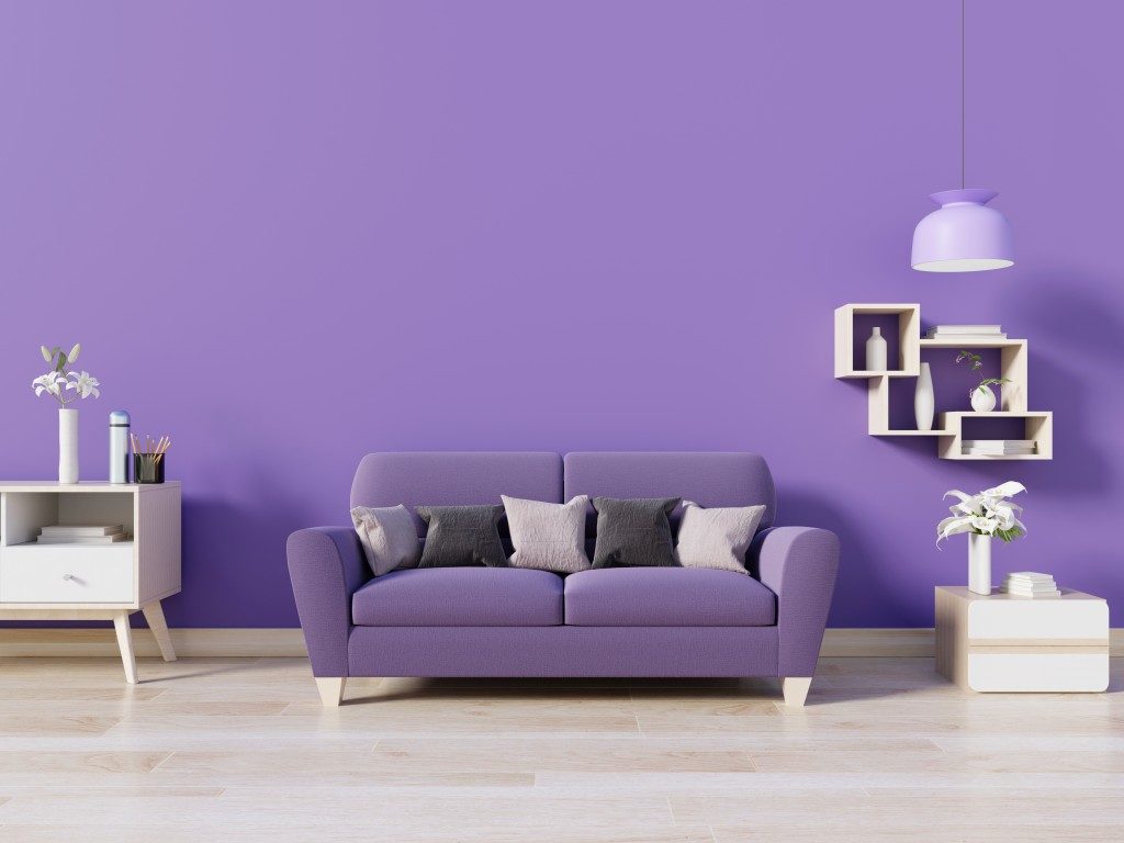 purple wall with purple and white furnishing