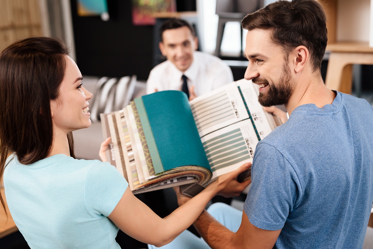 Couple choosing new color of walls