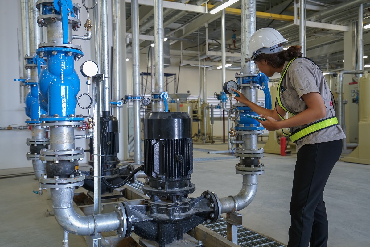 Engineer checking water pump