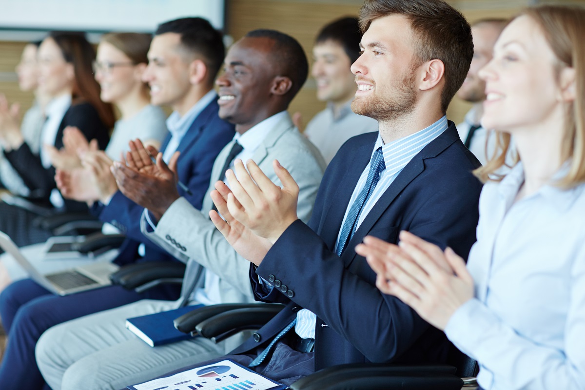 employees clapping hands