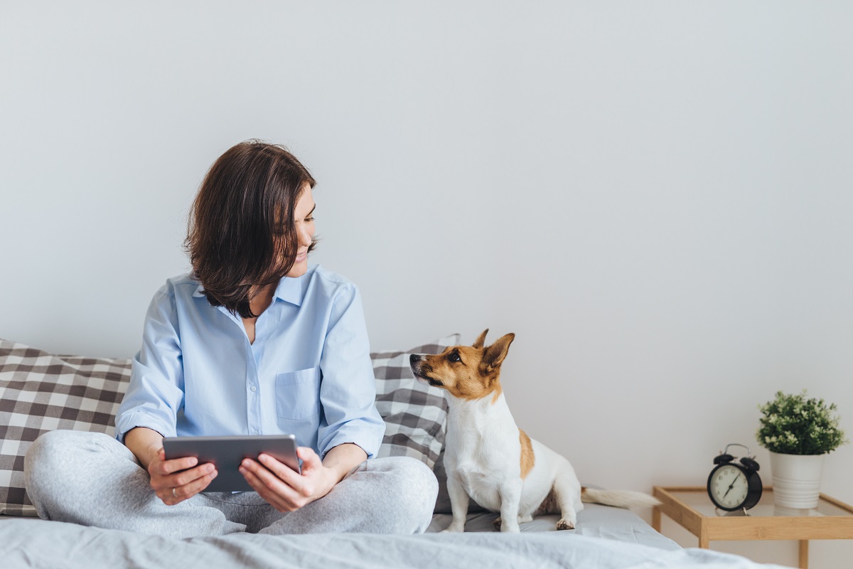 woman with her pet dog