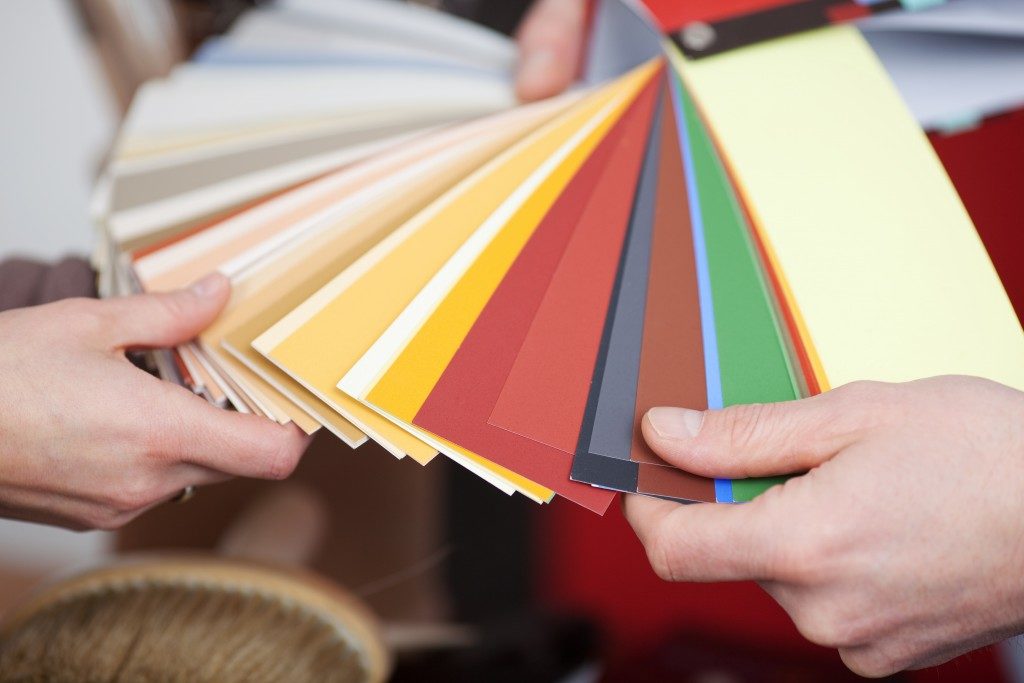 people looking through color swatches