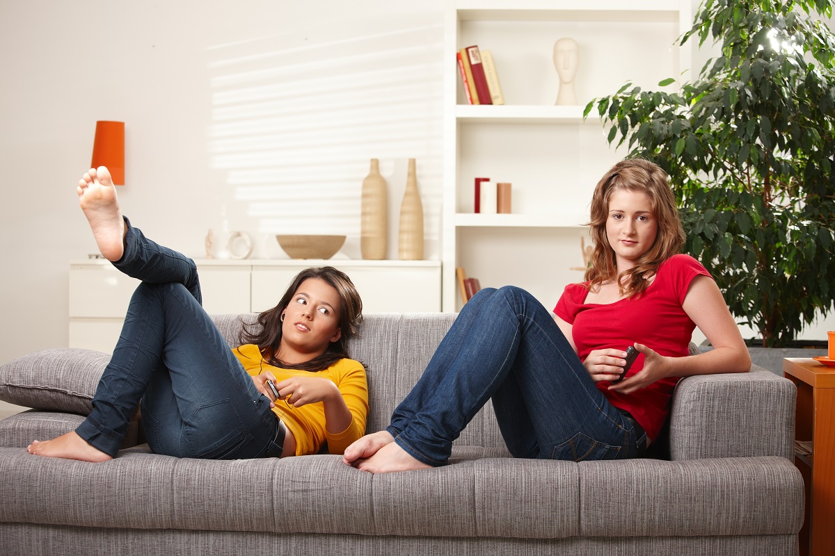 girls relaxing on the couch