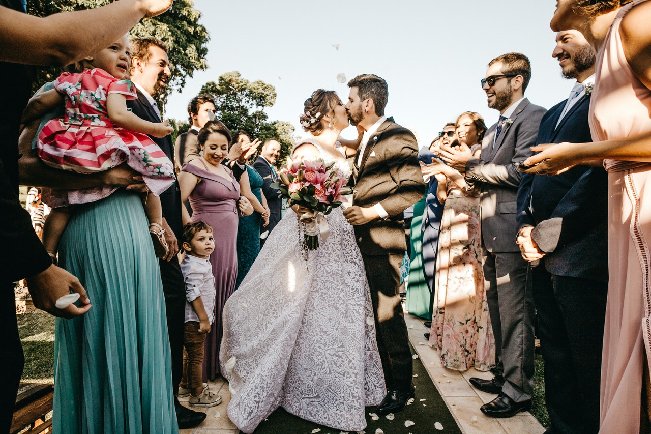 bride and groom with friends