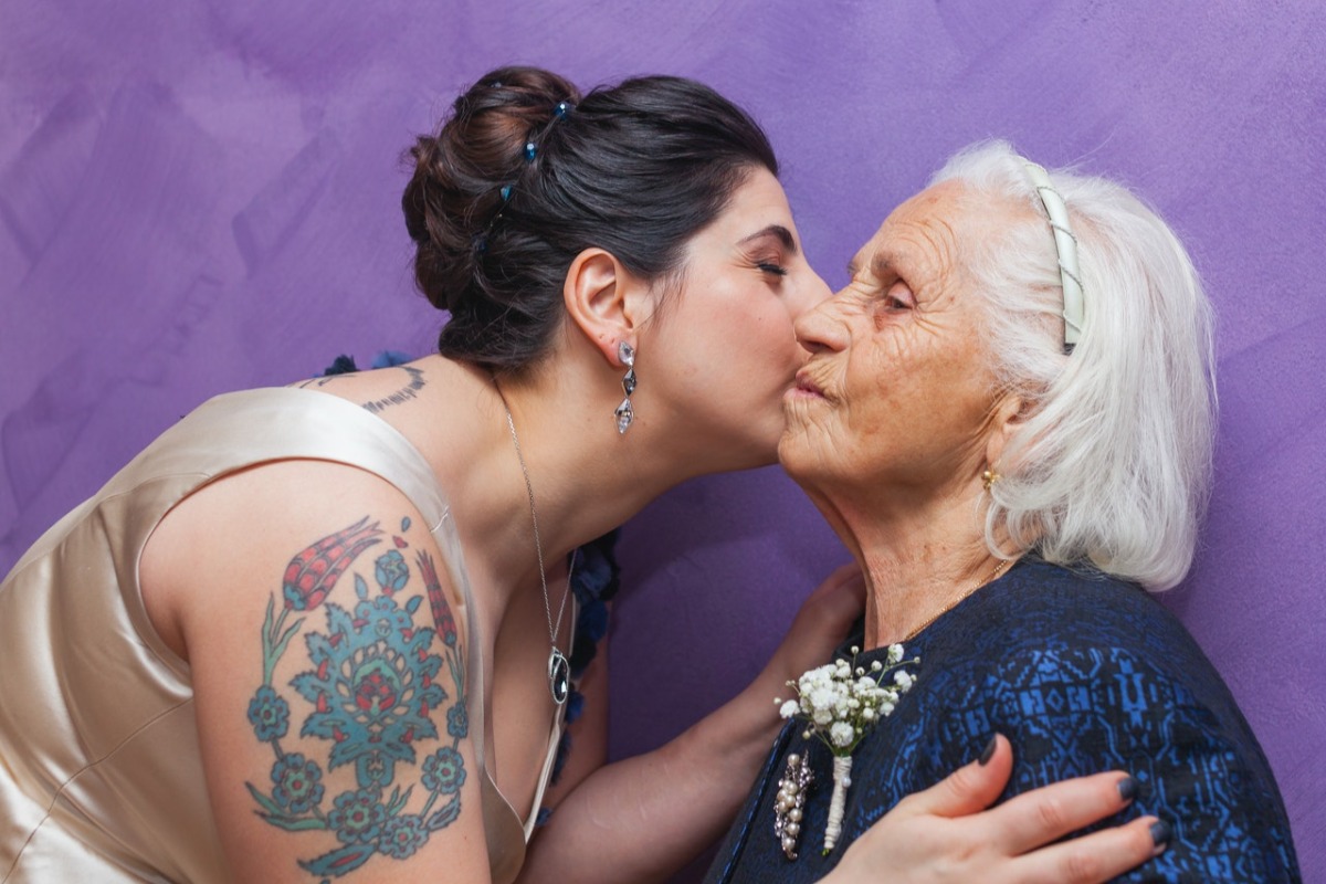 woman kissing her mother