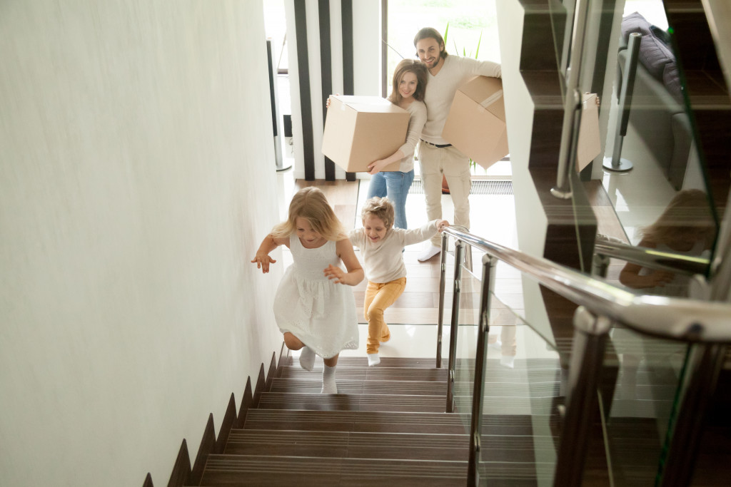 a family moving inside a new house