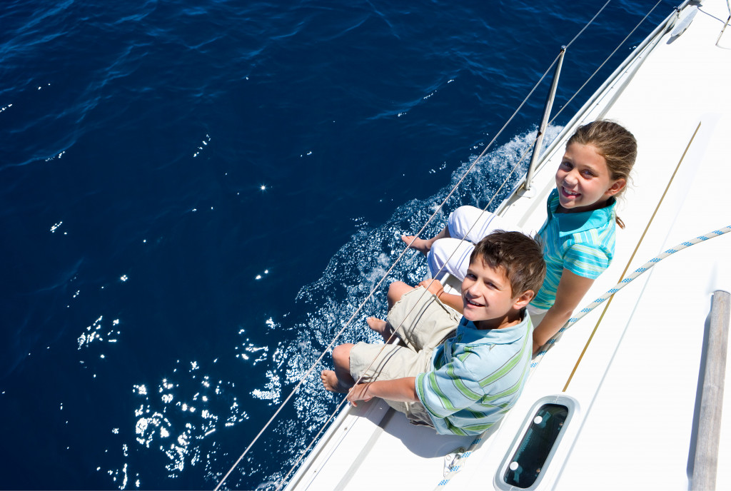 kids on a boat