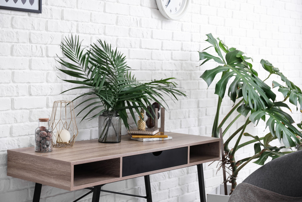 Tropical plants in a minimalist room of a house