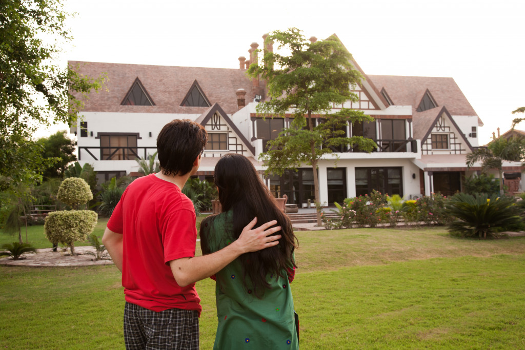 A couple looking at a house