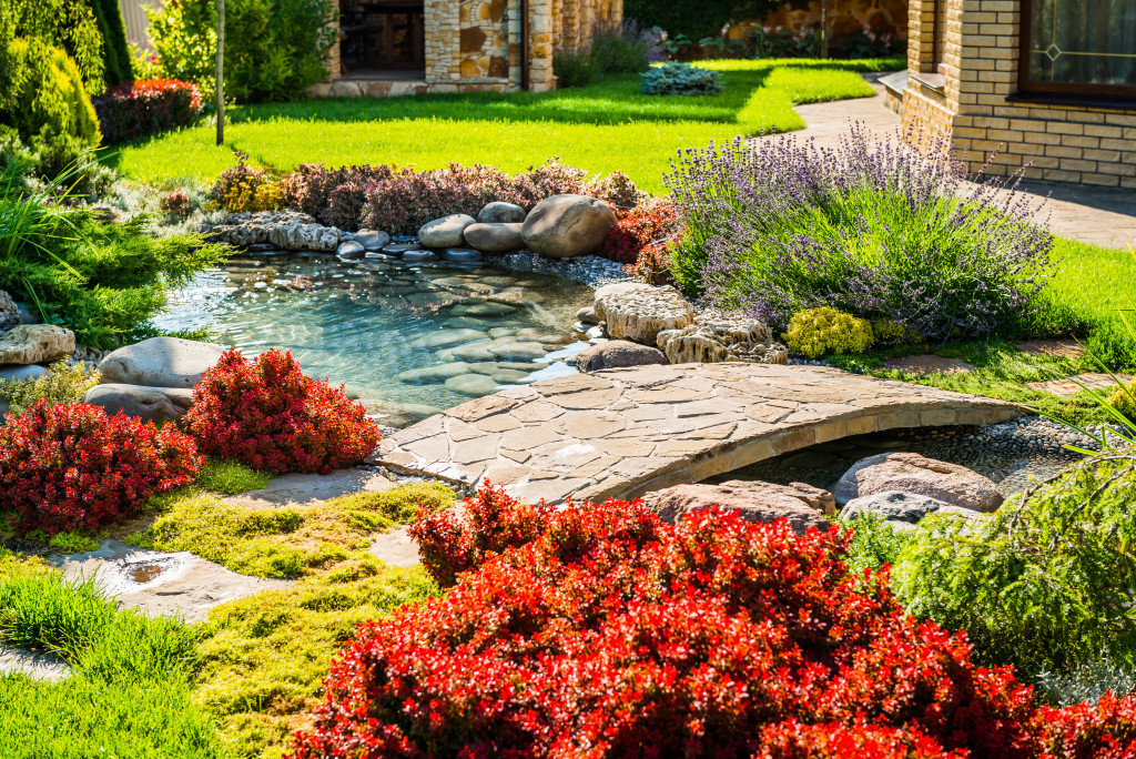 Portrait of a home garden with small pond